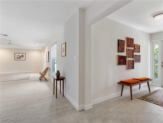 3704 Blue Heron Dr, Fort Myers, FL 33908 - corridor featuring light wood-style floors and baseboards