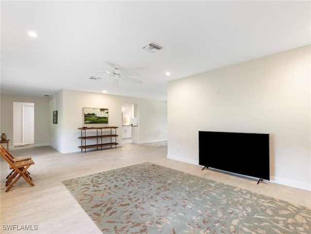 3704 Blue Heron Dr, Fort Myers, FL 33908 - living room featuring a ceiling fan, light wood-type flooring, and recessed lighting