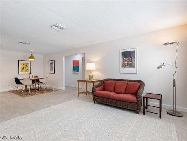 3704 Blue Heron Dr, Fort Myers, FL 33908 - living room featuring baseboards