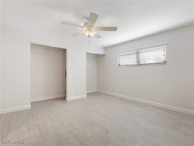 3704 Blue Heron Dr, Fort Myers, FL 33908 - empty room with light wood-type flooring and ceiling fan