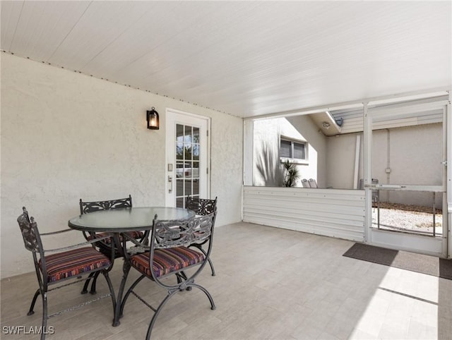 3704 Blue Heron Dr, Fort Myers, FL 33908 - sunroom / solarium featuring outdoor dining area
