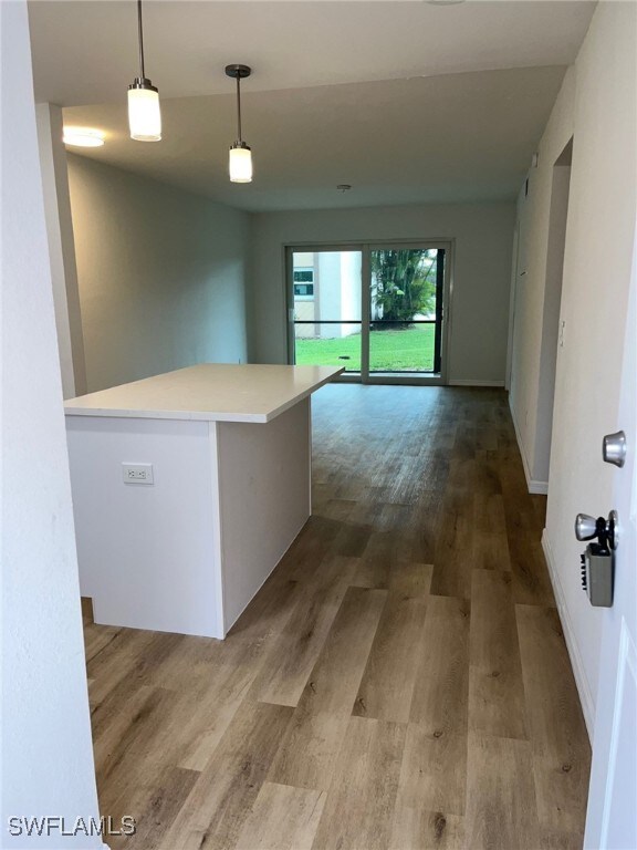 16881 Davis Rd Unit 713, Fort Myers, FL 33908 - corridor with wood finished floors