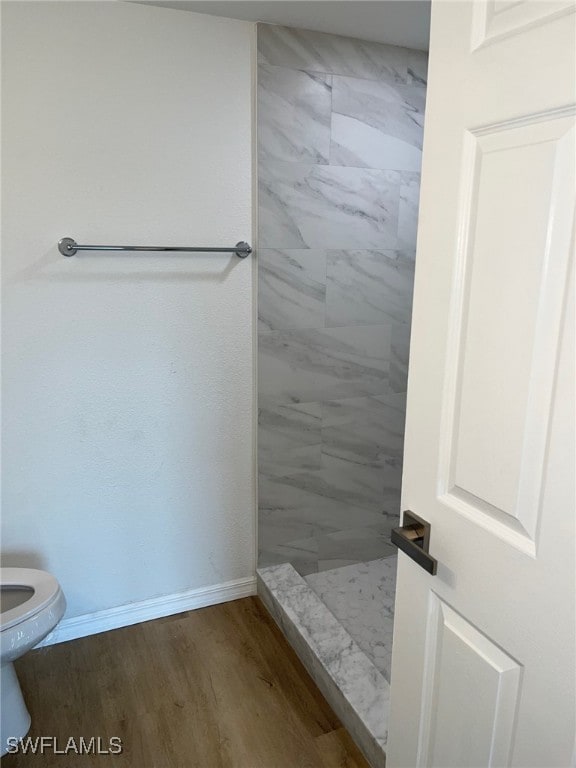 16881 Davis Rd Unit 713, Fort Myers, FL 33908 - bathroom with a stall shower and wood finished floors