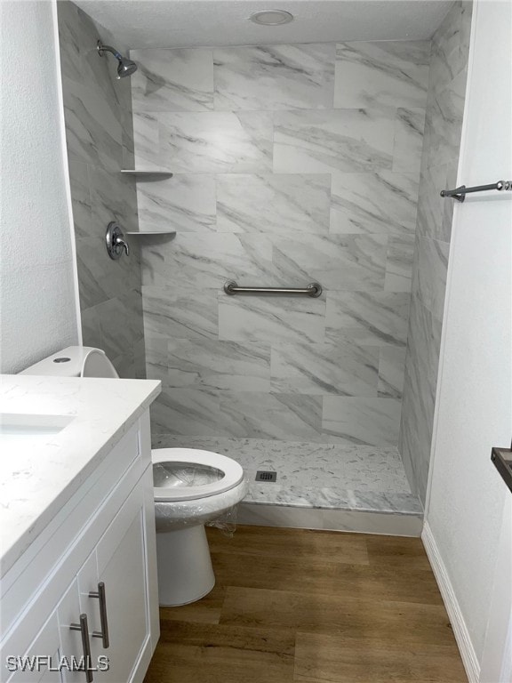 16881 Davis Rd Unit 713, Fort Myers, FL 33908 - full bath with vanity, a marble finish shower, and wood finished floors