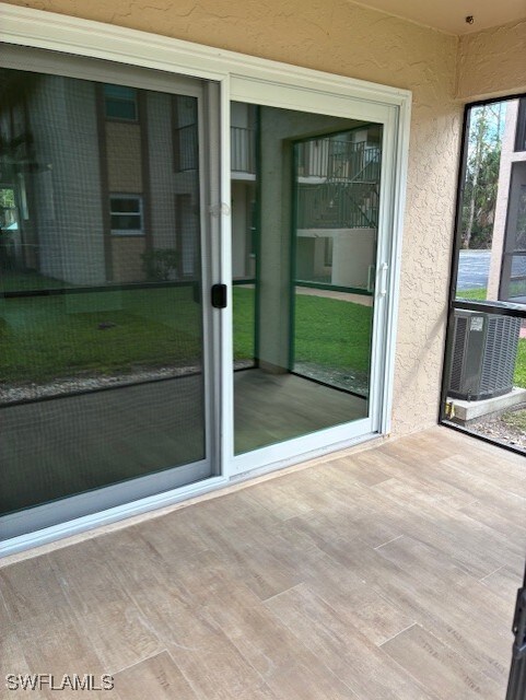 16881 Davis Rd Unit 713, Fort Myers, FL 33908 - view of unfurnished sunroom