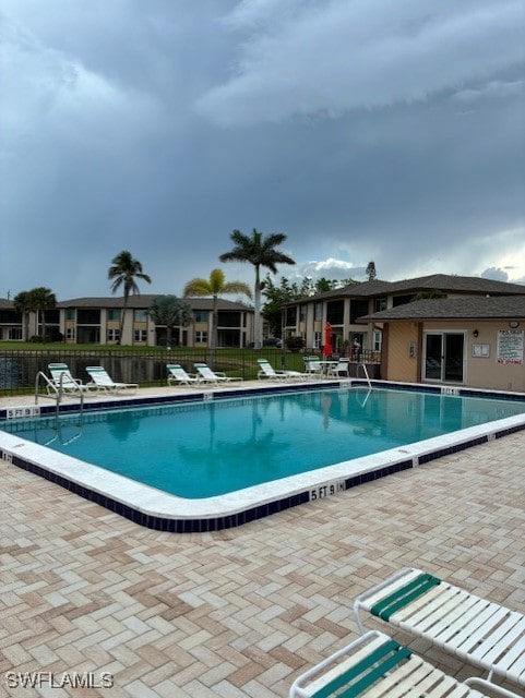 16881 Davis Rd Unit 713, Fort Myers, FL 33908 - community pool with a patio area