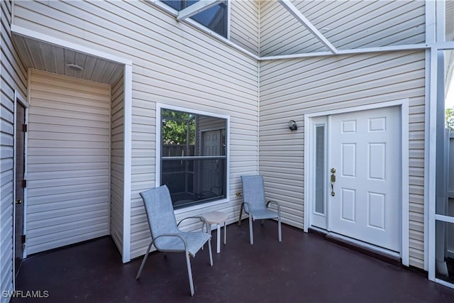 8441 N Haven Ln Unit B, Fort Myers, FL 33919 - view of exterior entry featuring a patio