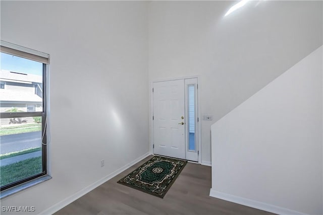 8441 N Haven Ln Unit B, Fort Myers, FL 33919 - entrance foyer featuring wood finished floors and a towering ceiling