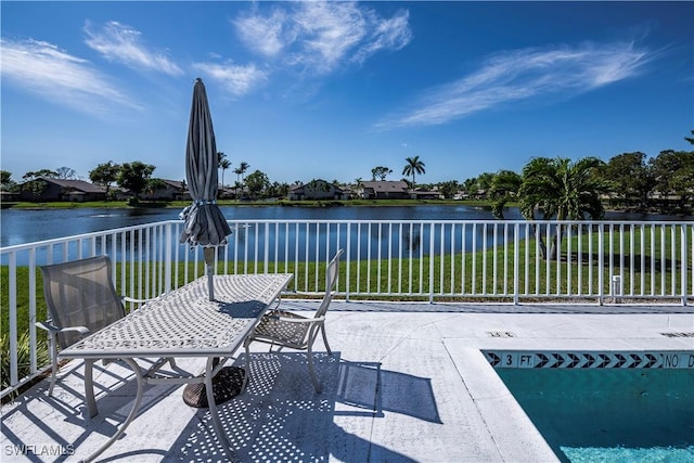 8441 N Haven Ln Unit B, Fort Myers, FL 33919 - view of patio with a water view and outdoor dining area