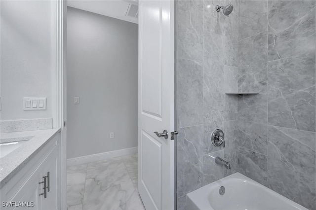 4447 26th Ave SE, Naples, FL 34117 - bathroom with marble finish flooring, shower / washtub combination, and vanity