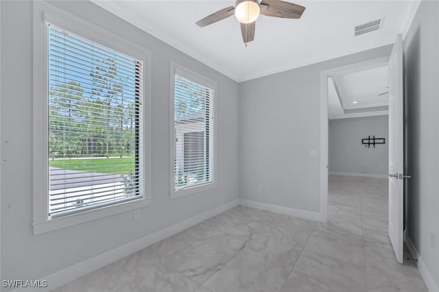 4447 26th Ave SE, Naples, FL 34117 - unfurnished room featuring light marble finish flooring, crown molding, and a ceiling fan