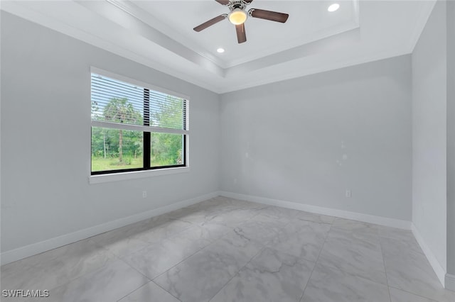 4447 26th Ave SE, Naples, FL 34117 - empty room featuring ceiling fan, light marble finish floors, crown molding, recessed lighting, and a tray ceiling