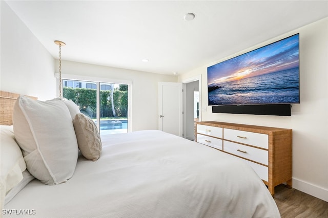 646 Park Shore Dr, Naples, FL 34103 - bedroom with wood finished floors and baseboards