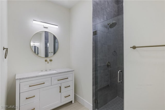 3801 14th St W, Lehigh Acres, FL 33971 - bathroom featuring a shower stall, vanity, and tile patterned flooring