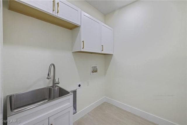 3801 14th St W, Lehigh Acres, FL 33971 - washroom featuring cabinet space, washer hookup, and electric dryer hookup