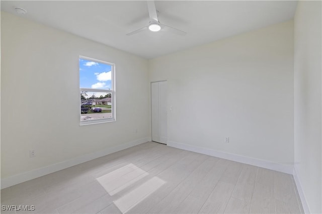 3801 14th St W, Lehigh Acres, FL 33971 - empty room featuring a ceiling fan and light wood-style flooring