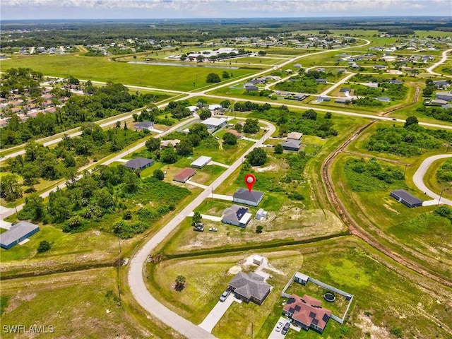 7071 Tide Cir, Labelle, FL 33935 - aerial view of property and surrounding area featuring nearby suburban area