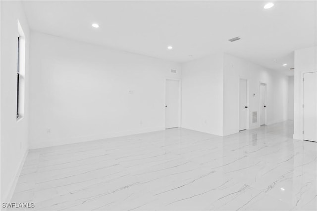 7071 Tide Cir, Labelle, FL 33935 - unfurnished room with recessed lighting and light marble finish flooring