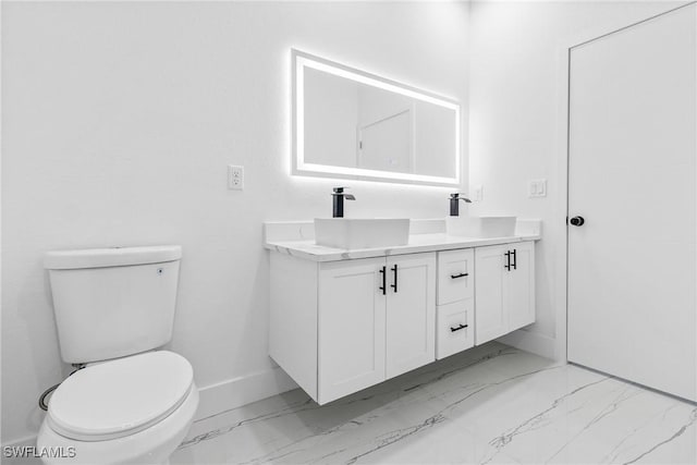 7071 Tide Cir, Labelle, FL 33935 - bathroom featuring marble finish floors and double vanity