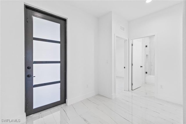 7071 Tide Cir, Labelle, FL 33935 - empty room featuring light marble finish flooring and recessed lighting