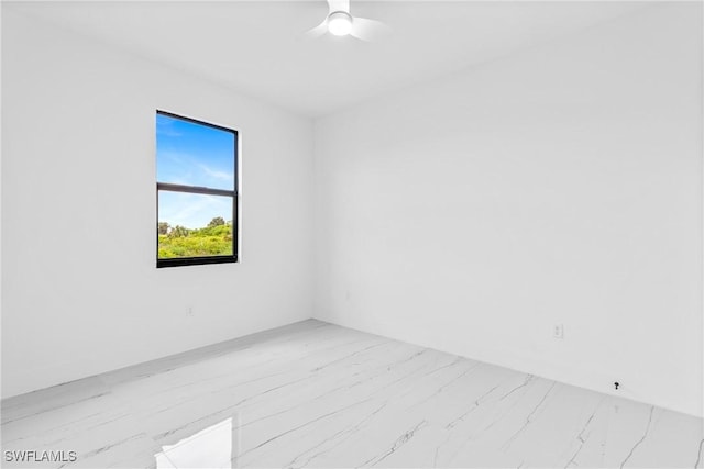 7071 Tide Cir, Labelle, FL 33935 - unfurnished room with light marble finish floors and a ceiling fan