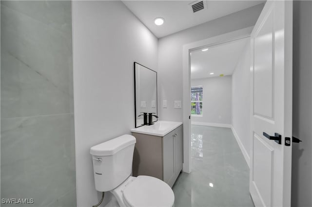 1132 Ravenswood St E, Lehigh Acres, FL 33974 - bathroom with vanity and recessed lighting