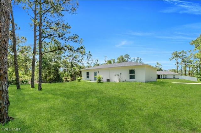 1132 Ravenswood St E, Lehigh Acres, FL 33974 - view of grassy yard