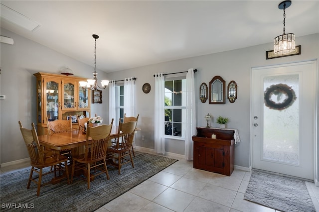 2804 NW 6th St, Cape Coral, FL 33993 - dining area with a chandelier, lofted ceiling, and light tile patterned floors
