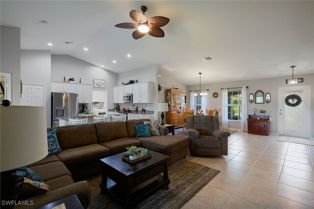 2804 NW 6th St, Cape Coral, FL 33993 - living area featuring light tile patterned flooring, lofted ceiling, a ceiling fan, a chandelier, and recessed lighting
