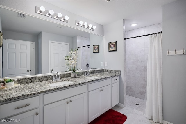 2804 NW 6th St, Cape Coral, FL 33993 - full bath with double vanity and a tile shower