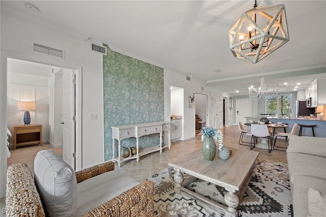 14040 Heritage Landing Blvd Unit 115, Punta Gorda, FL 33955 - living area featuring a chandelier, ornamental molding, light tile patterned floors, and stairs