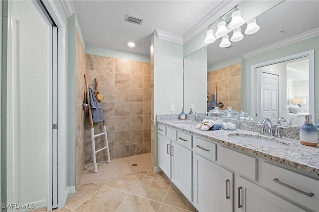 14040 Heritage Landing Blvd Unit 115, Punta Gorda, FL 33955 - ensuite bathroom with ornamental molding, double vanity, a walk in shower, and tile patterned flooring
