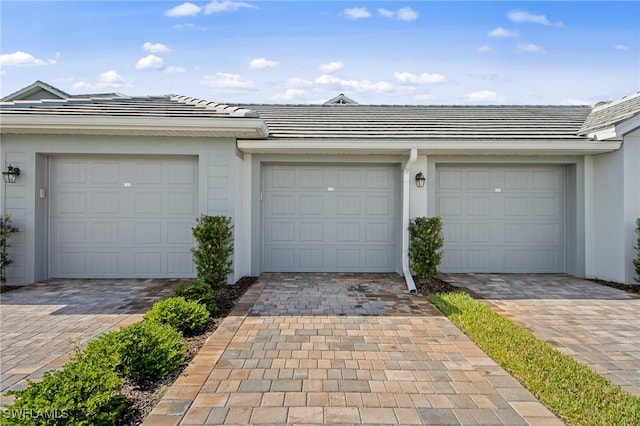 14040 Heritage Landing Blvd Unit 115, Punta Gorda, FL 33955 - garage with driveway