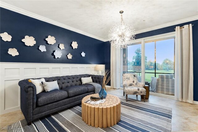 14040 Heritage Landing Blvd Unit 124, Punta Gorda, FL 33955 - living area featuring a chandelier, ornamental molding, a decorative wall, and a wainscoted wall