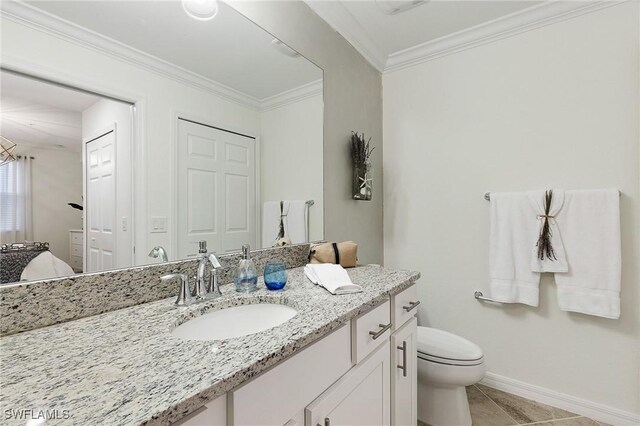 14040 Heritage Landing Blvd Unit 124, Punta Gorda, FL 33955 - bathroom with vanity, ornamental molding, and tile patterned floors