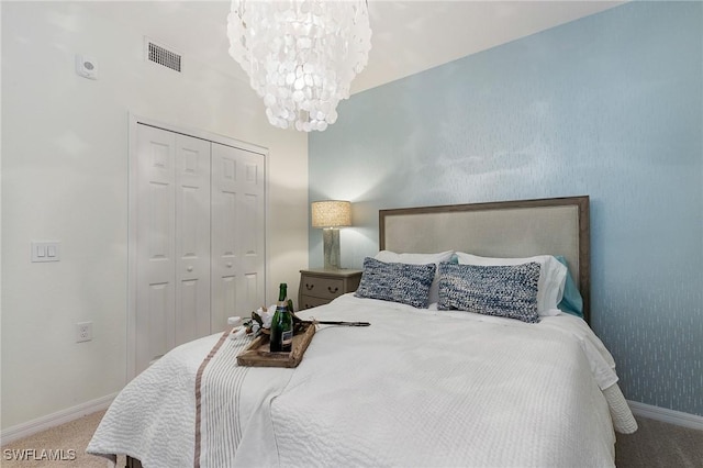 14040 Heritage Landing Blvd Unit 124, Punta Gorda, FL 33955 - carpeted bedroom with a closet and a chandelier