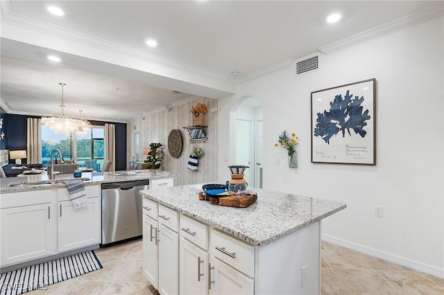 14040 Heritage Landing Blvd Unit 124, Punta Gorda, FL 33955 - kitchen featuring dishwasher, a center island, arched walkways, light stone counters, and ornamental molding
