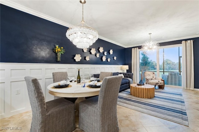 14040 Heritage Landing Blvd Unit 124, Punta Gorda, FL 33955 - dining space with a chandelier, a decorative wall, crown molding, and a wainscoted wall
