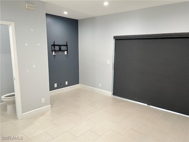 8241 Pacific Beach Dr, Fort Myers, FL 33966 - empty room featuring baseboards and recessed lighting