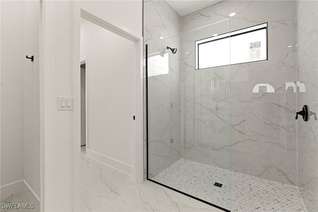 2616 42nd St W, Lehigh Acres, FL 33971 - bathroom featuring marble finish floors and a marble finish shower