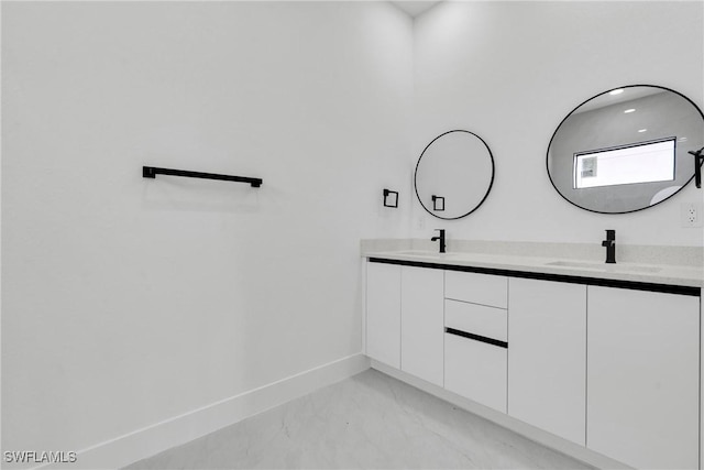 2616 42nd St W, Lehigh Acres, FL 33971 - full bath featuring double vanity and marble finish floors