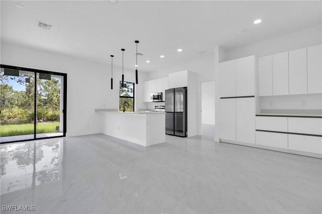 2616 42nd St W, Lehigh Acres, FL 33971 - unfurnished living room featuring recessed lighting