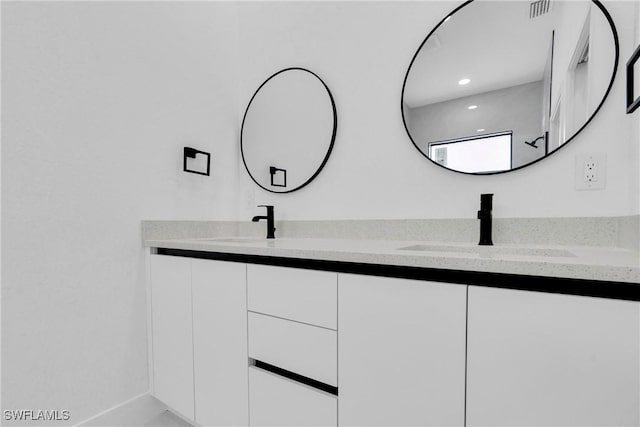 2616 42nd St W, Lehigh Acres, FL 33971 - full bath with double vanity and recessed lighting