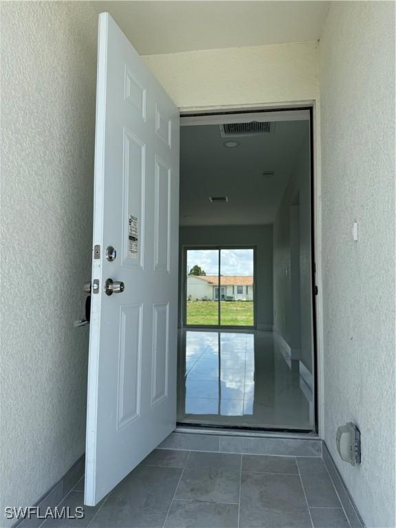 2902 27th St SW, Lehigh Acres, FL 33976 - view of exterior entry