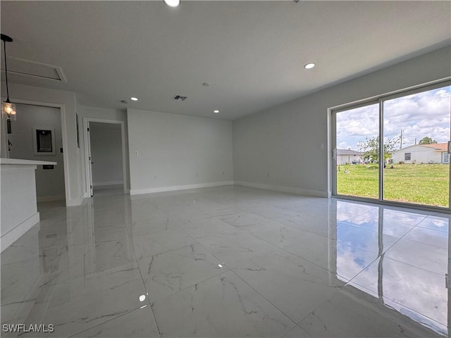 2902 27th St SW, Lehigh Acres, FL 33976 - unfurnished room featuring light marble finish flooring and recessed lighting