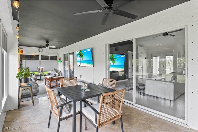 22 NW 14th Ave, Cape Coral, FL 33993 - view of patio featuring a ceiling fan and outdoor dining area