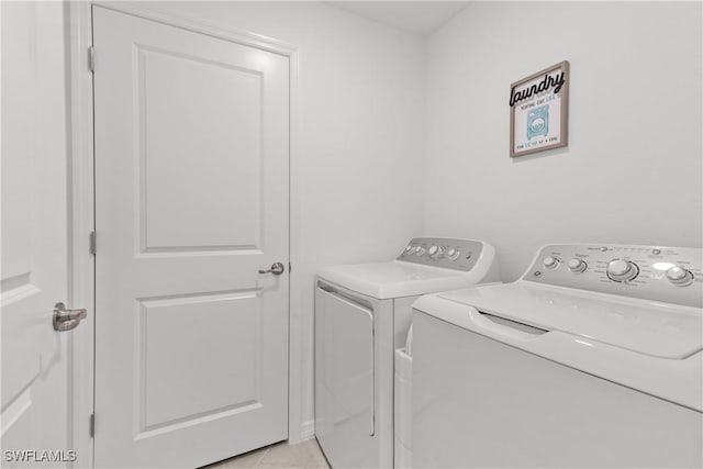 14818 Birchwood Ct Unit 6412, Punta Gorda, FL 33955 - laundry room with washing machine and clothes dryer