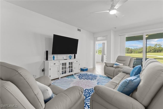 14818 Birchwood Ct Unit 6412, Punta Gorda, FL 33955 - living room featuring ceiling fan and light tile patterned floors