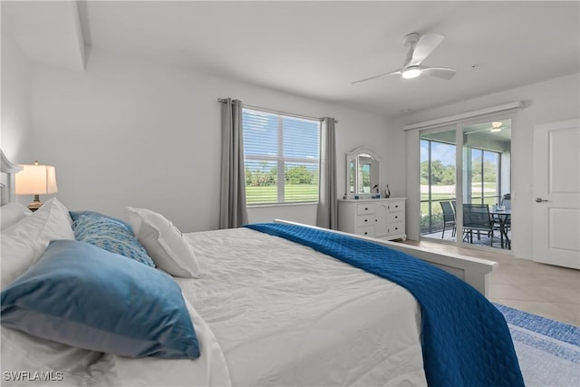 14818 Birchwood Ct Unit 6412, Punta Gorda, FL 33955 - tiled bedroom featuring access to exterior and ceiling fan