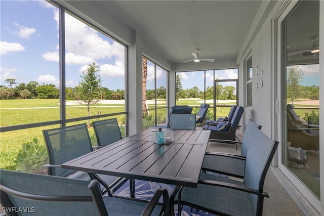 14818 Birchwood Ct Unit 6412, Punta Gorda, FL 33955 - sunroom with a ceiling fan, golf course view, and outdoor dining space